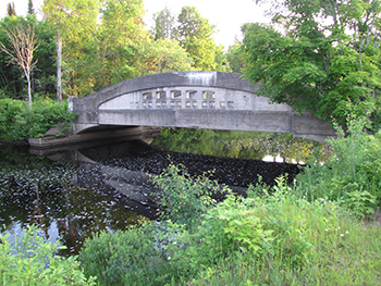 Stone bridge over a narrow stream